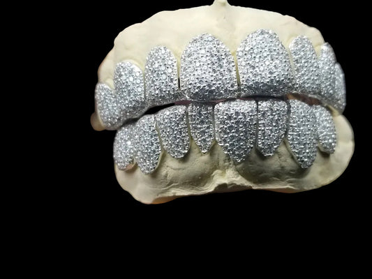 -CZ Diamonds V.V.S. Quality
.925 silver, per tooth (COMPLETLY BUSTDOWN) hand set💦