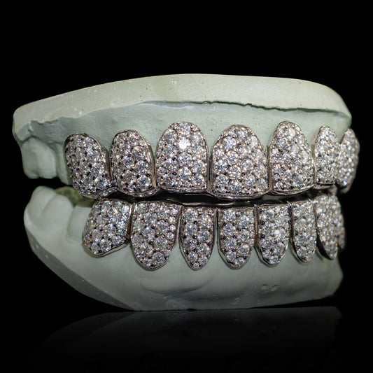 -CZ Diamonds V.V.S. Quality
.925 silver, per tooth (COMPLETLY BUSTDOWN) hand set💦