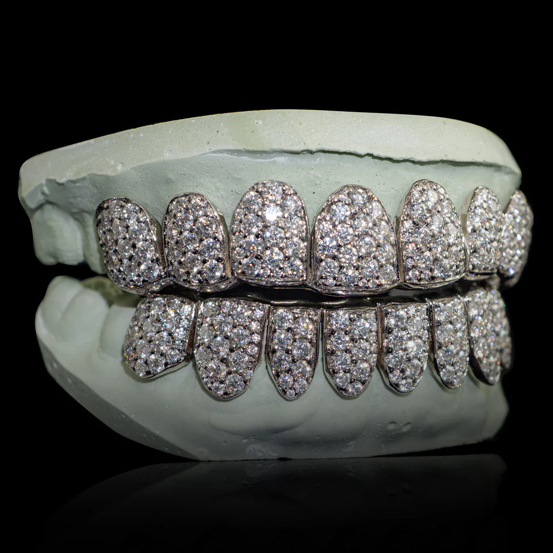 -CZ Diamonds V.V.S. Quality
.925 silver, per tooth (COMPLETLY BUSTDOWN) hand set💦