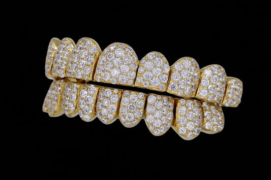 10kt VVS qaulity Moissanite Diamonds, per tooth (COMPLETLY BUSTDOWN) hand set