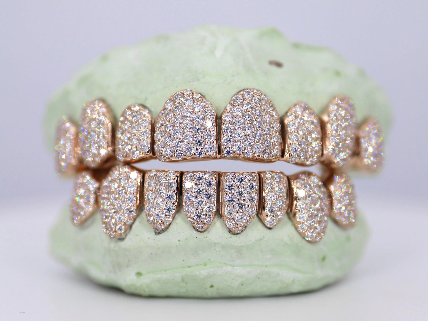 10kt VVS qaulity Moissanite Diamonds, per tooth (COMPLETLY BUSTDOWN) hand set