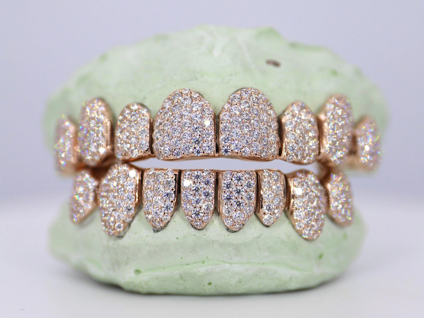10kt VVS qaulity Moissanite  Diamonds, per tooth (COMPLETLY BUSTDOWN) hand set