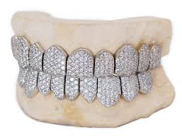 .925 silver cubic zirconia  Diamonds, per tooth (COMPLETLY BUSTDOWN) hand set