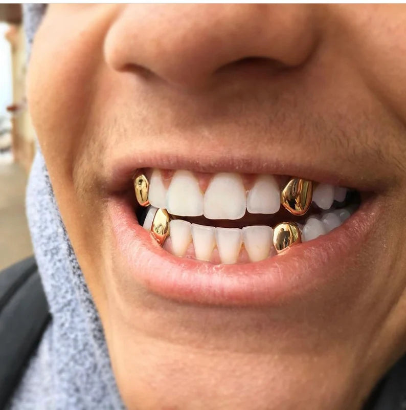 18kt gold per tooth (pullouts) Grills